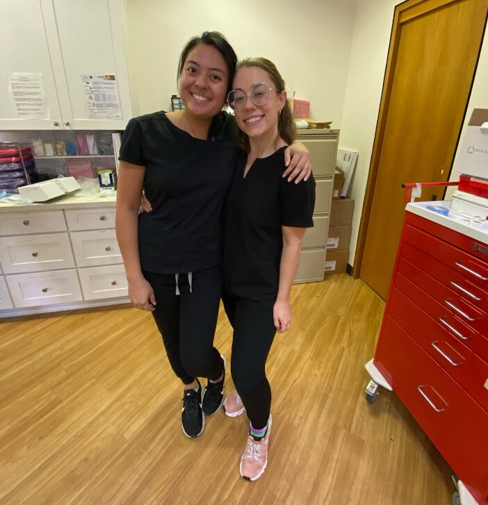 People smiling in a clinic